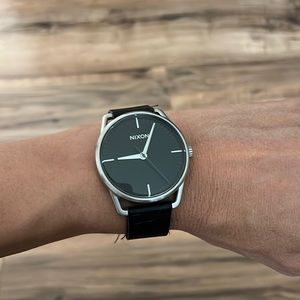 Silver and black Nixon watch